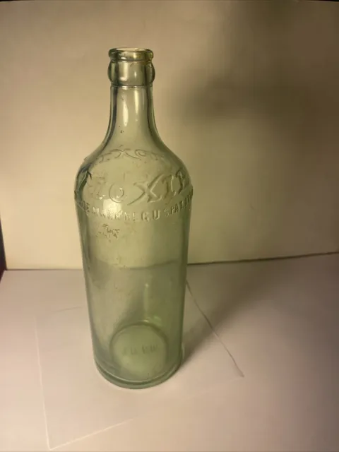 Antique Glass Moxie Bottle