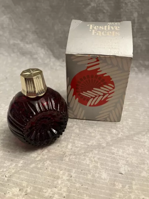 Avon Festive facets charisma cologne. New full. 1 fl. Oz. Red glass ornament.