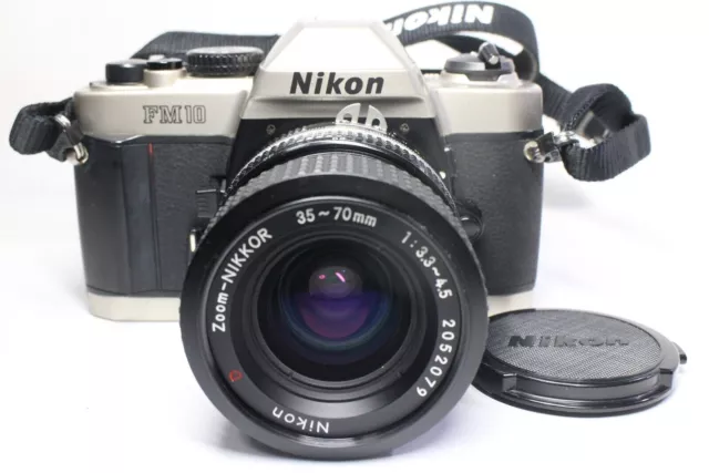 Cámara de película Nikon FM10 SLR de 35 mm y lente Nikkor con zoom Ai-S D...