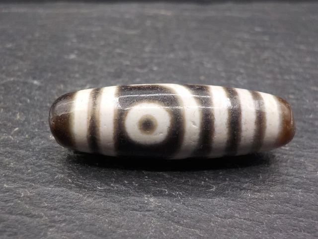 An Agate Dzi bead with a 2 Eye pattern from Tibet / Nepal.