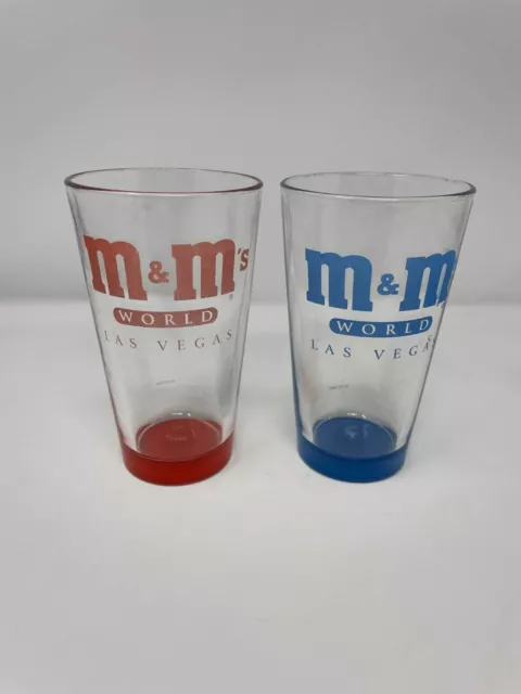 M&M WORLD LAS VEGAS LOT OF 2 Pint Collectible Glasses Red and Blue