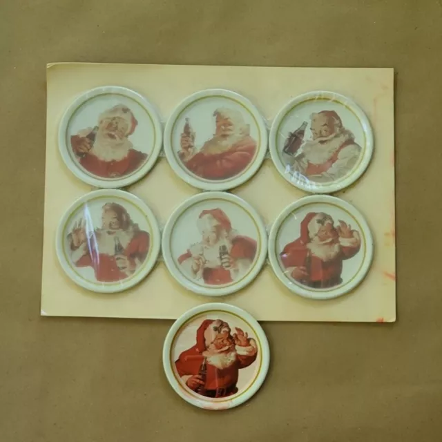 Set of 7 Coca Cola Santa Tin Coasters Vintage Collectible Metal Christmas Santa