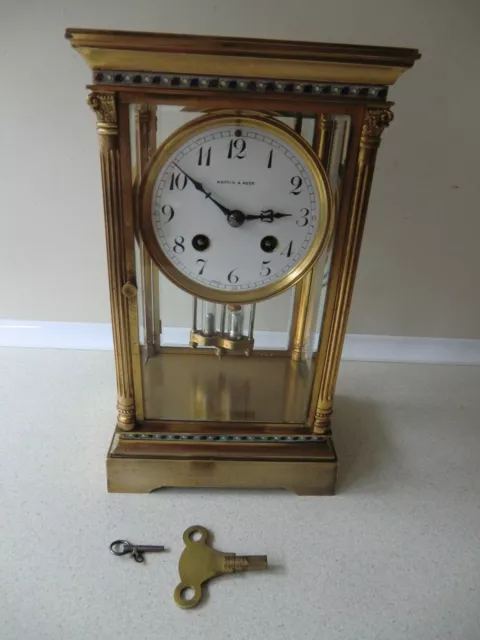 French Brass Four Glass Mantel Clock by Mappin & Webb .