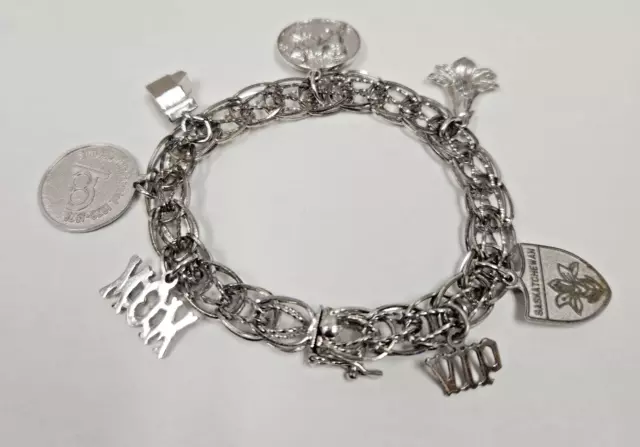 Vintage Sterling Silver Charm Bracelet Ster. 7 Charms