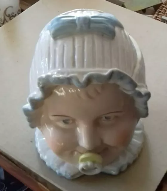 A Porcelain Baby Head Tobacco Jar With Lid, Bon-Bon, Cotton Wool Etc.