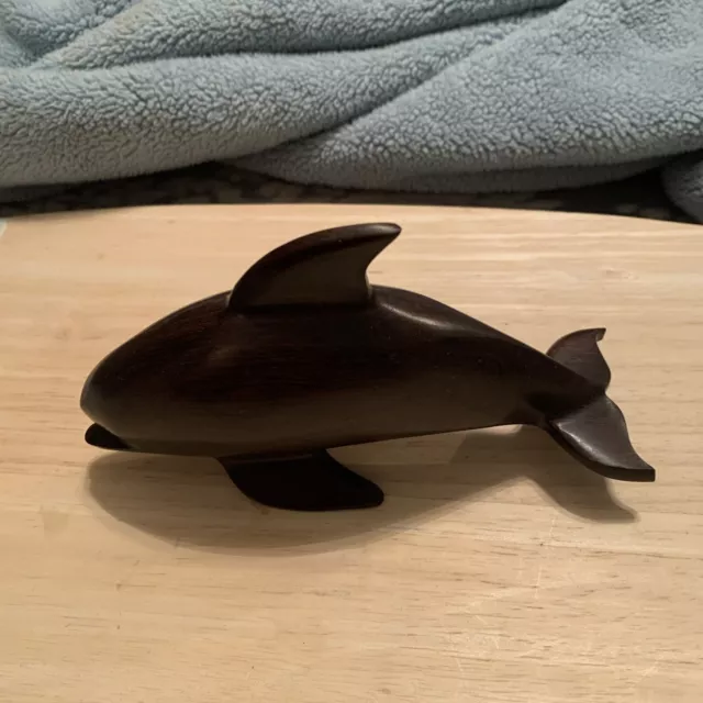 Polished wood carved dolphin 6”