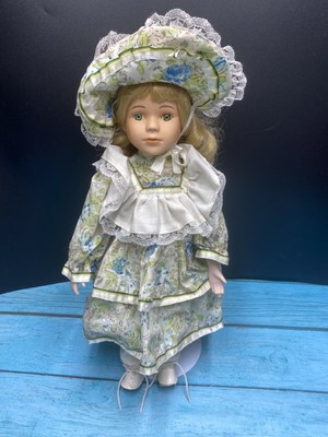 Victorian Style Porcelain Doll with Green Flower Dress Hat Green Eyes Curly Hair