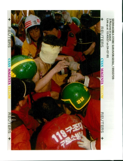Rescue workers carry 21-year-old part time depa... - Vintage Photograph 1594811