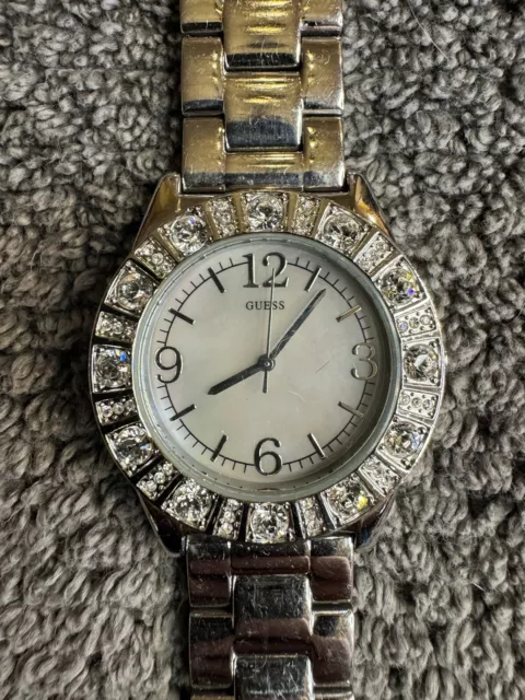 Guess Womens watch silver tone round bling bezel mother of peral dial G86060L