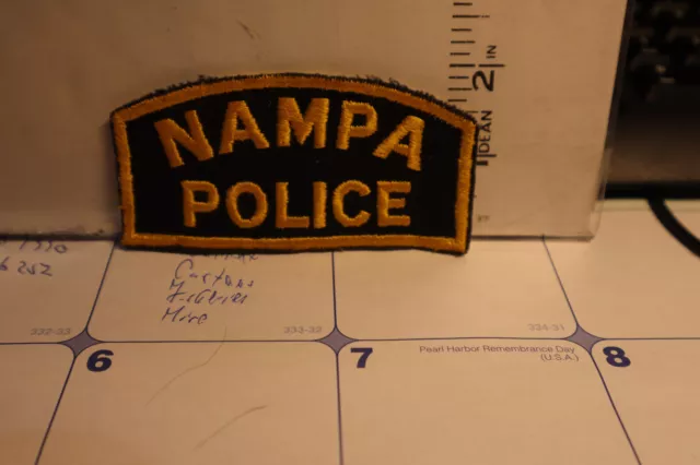 police patch   NAMPA POLICE IDAHO  YELLOW BORDERS AND LETTERING