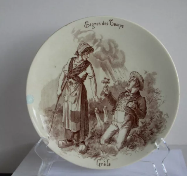  assiette  Céramique et Faïence de  SARREGUEMINES  U § Cie "SIGNES DES TEMPS"