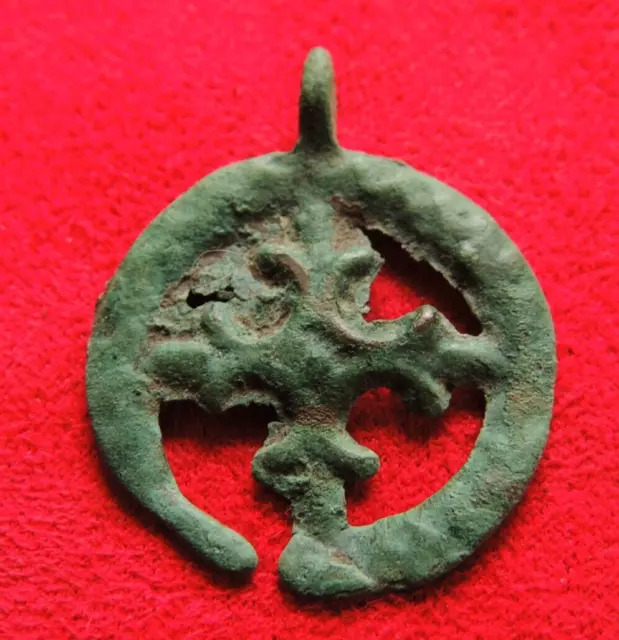 Ancient bronze pendant with a cross 10th-12th century