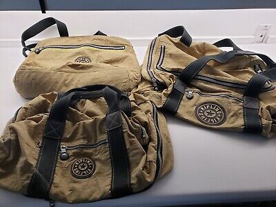 Kipling Travel Trio, set of 3 different size bags, beige, many zippers. 