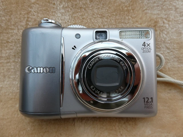 Canon PowerShot A1100 IS 12.1MP Camera plus SD card and case - used