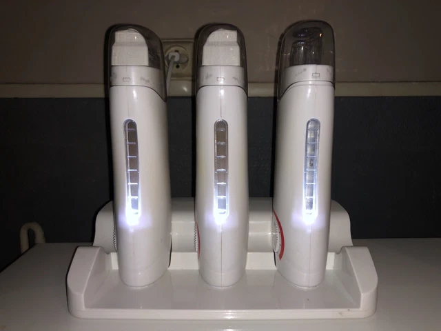 DEO Triple Handheld Roller Wax Cartridge Heater with Strip Base.