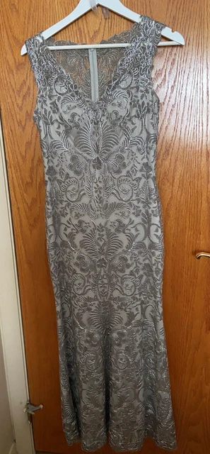 gown size 4, elegant, lace with silver threading for sparkle, worn once