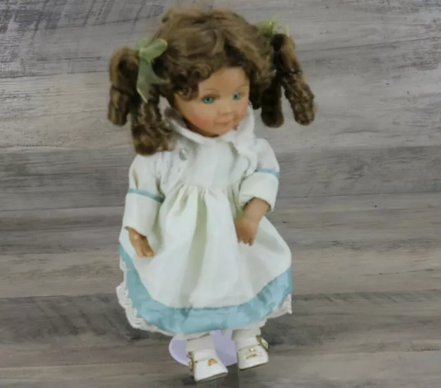 The Emerald Doll Collection Porcelain Little Girl in Dress Embroidered Collar
