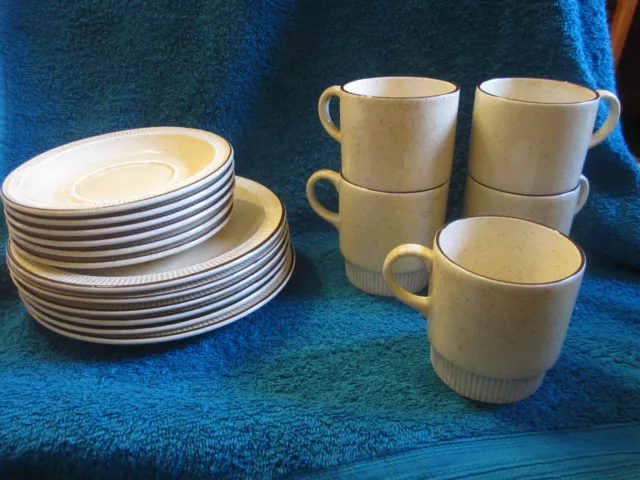 Poole pottery Parkstone? Cups (5)  saucers (6)  and plates (6). Brown rim.