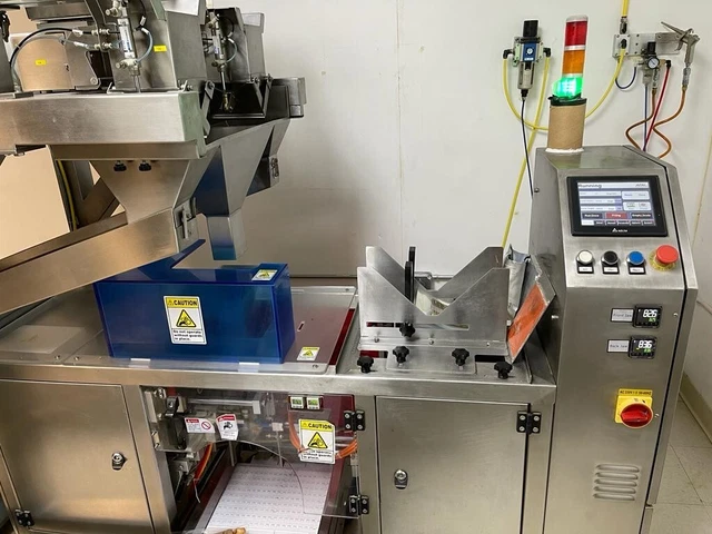 Automated Premade Bag Filling and Sealing Packing Machine - APAI ECONOPOUCH