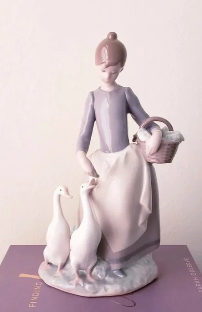Nao by Lladro Collectible Porcelain Figurine: Girl Feeding Geese - 10" tall