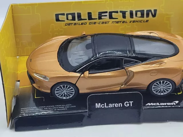 McCLAREN GT in GOLD / BLACK 1.38 WELLY DIECAST MODEL TOY CAR BOXED NEW BOYS TOYS