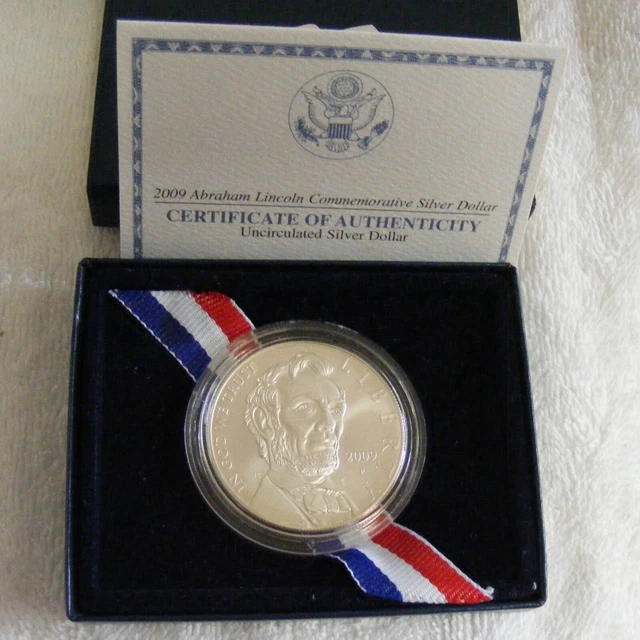 (1) 2009 Abraham Lincoln $1 Unc Commemorative Silver Dollar Coin  Box And Coa