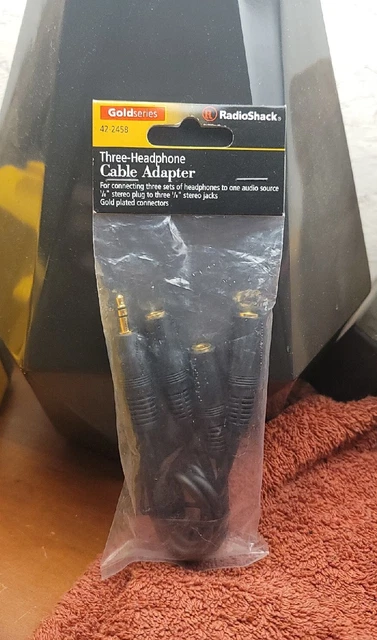 Radio Shack Headphone Splitter Cable. 1/8'' Male to 3 - 1/8” Females. 42-2458. Radio Shack Headphone Splitter Cable. 1/8'' Male to 3 - 1/8” Females. 42-2458.