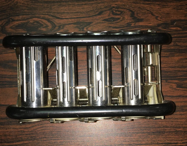Vintage Four-Slot McGill High Speed Changer Coin Dispenser