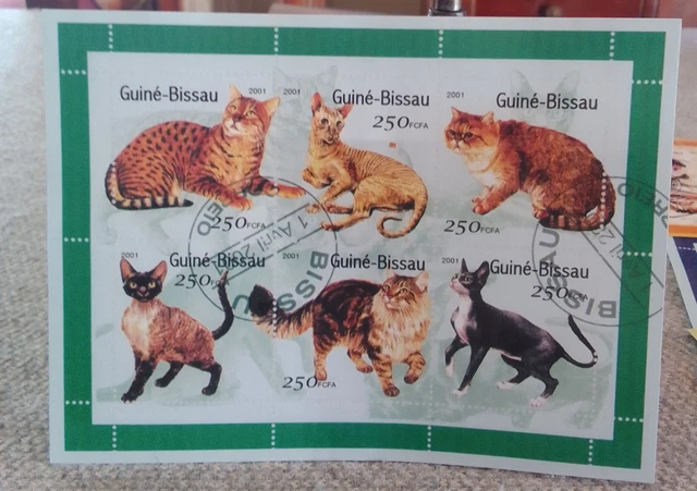 # 4 sheets stamped Guine' Bissau 2001 stamps. 2