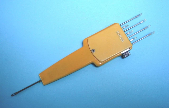 Herramienta de transferencia ajustable 1X7 4.5mm / 9mm máquina de tejer - usada (Toyota)