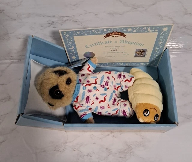 Compare the meerkat baby oleg with cuddle grub soft toy 7 00