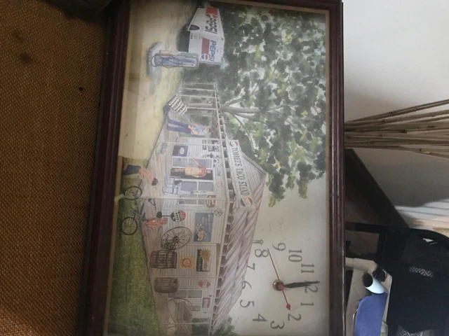antique Pepsi clock of old store with delivery truck like a work of art