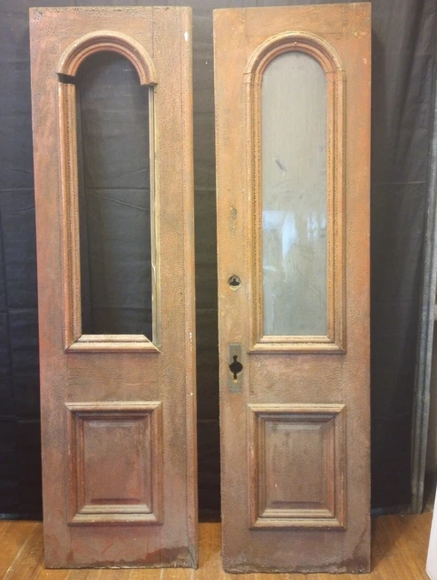 Pair of 3/4 Arched Glass & Raised Panel Exterior Doors 24 1/8" x 88"