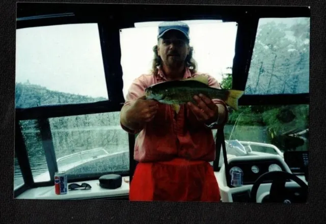 Vintage Photograph Man on Boat Holding Up Large Fish