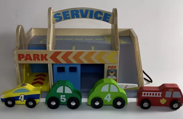 Melissa & Doug Service Station Car Wash Parking Garage with 3 Cars 1 Fire Engine