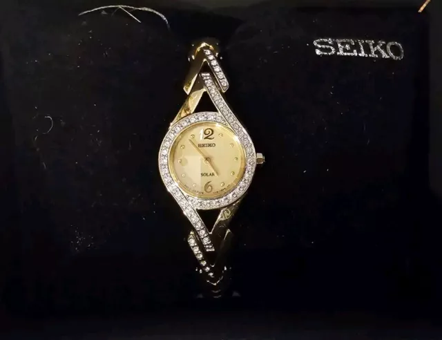 Seiko SUP176 Women's Swarovski Crystal-Accented Stainless Steel Solar Watch