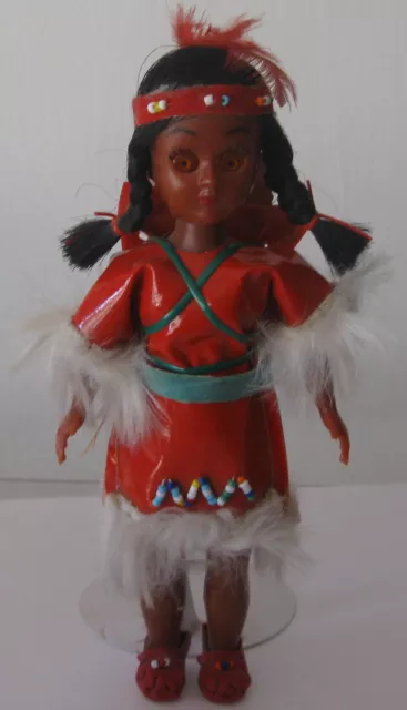 Doll with two children in an Indian costume.1970s