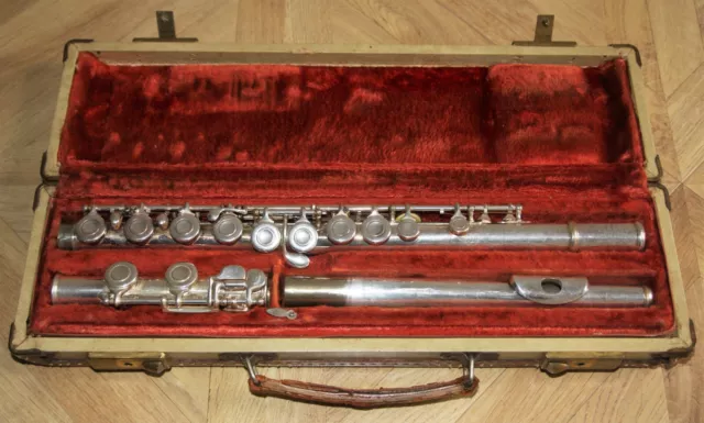 1960 Artley Elkhart USA flute, original case silver plate serviced plays 100%.