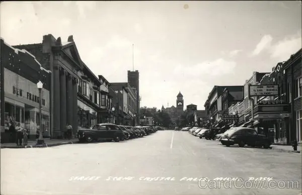 1955 RPPC Crystal Falls,MI Main Street Scene Iron County Michigan Postcard