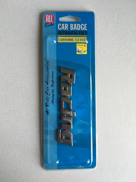 All Ride Stick On Chrome Style Car Badge In The Shape Of Racing, Brand New.