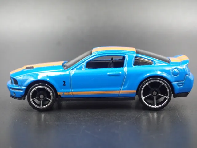 Ford Mustang 08 Bleue auto horloge miniature