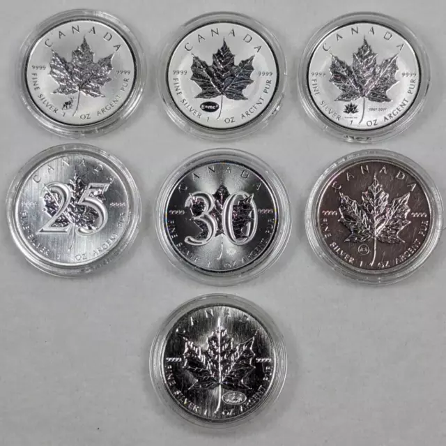 Collection of 7 "Interesting" 9999 Silver Canadian Maple Leaf 1oz Coins