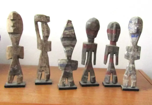 Six small wooden figures from Ghana.