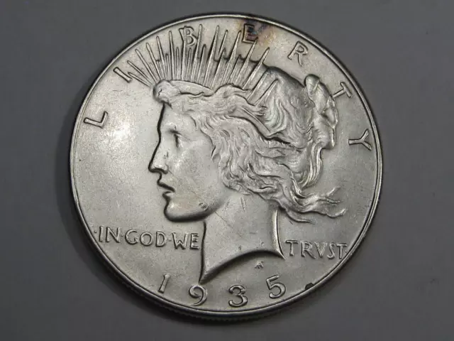 Better Grade 1935 Silver Peace Dollar. #28