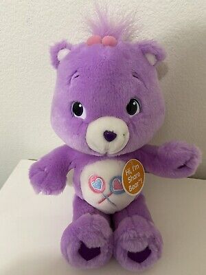 purple care bear with two lollipops