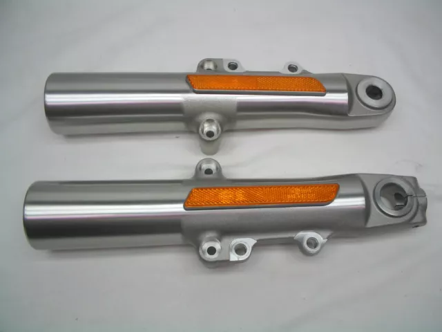 Pair Of Stock OEM Lower Fork Sliders - NEW TAKE OFF - Harley Touring '14-later