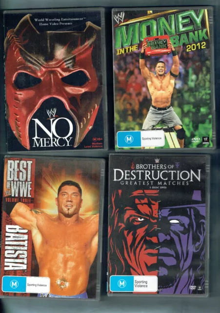 #ZZ.   LOT OF FOUR (4) WRESTLING  DVDs