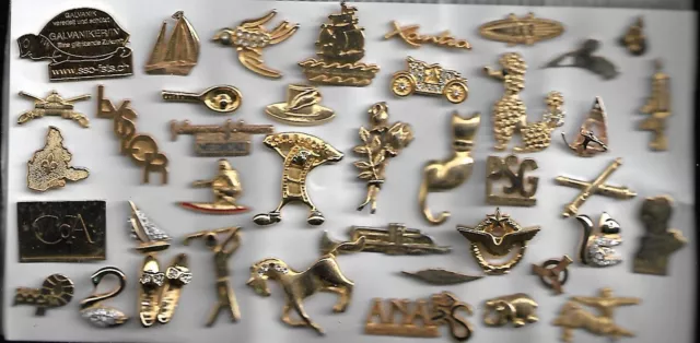 lot de 40 pin's dorés : animaux,sports,voitures,avions,armée......