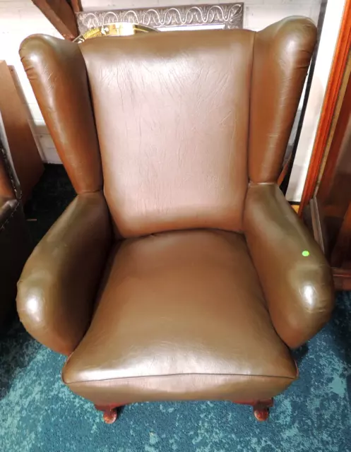 Two vintage Brown Faux-Leather Wingback Chairs: very comfortable