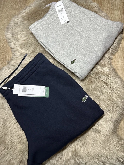 Survetement online lacoste faux